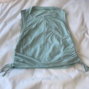 Like-new lululemon cropped tank size four mint green/teal